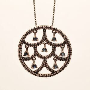 Sterling Silver Celestial Kinetic Circle Pendant with Faceted Blue Spinel Drops